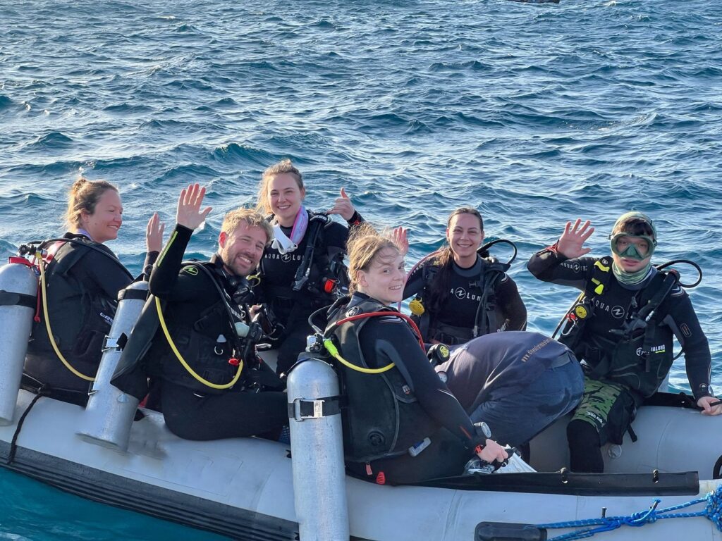 departure for dive safari in the red sea, scuba divers on the boat